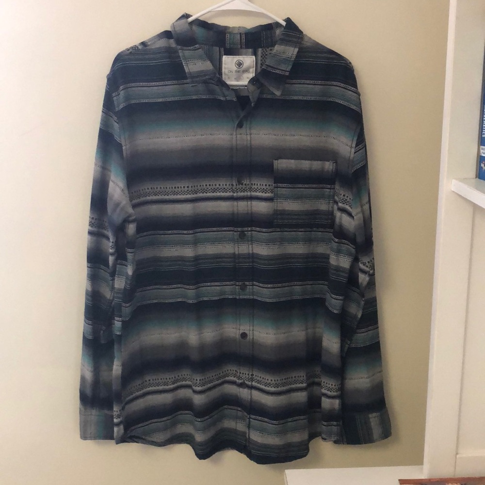 Large blue and gray tall button down.